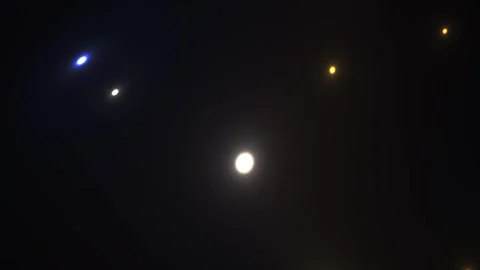 Abstract Cinematic Light Streaks and Glowing Orbs in Dark Night Sky. Stock Footage 340486973