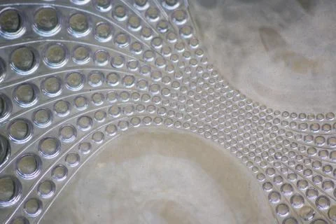 Abstract circle pattern in a glass brick as glass background Stock Photos