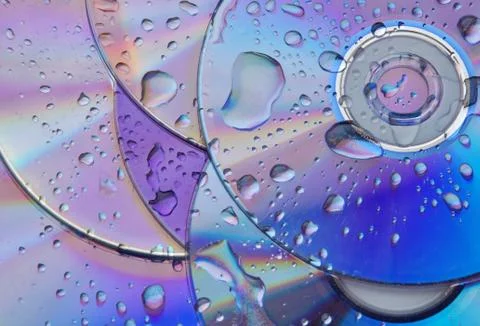 Abstract circles background. CDs SD multicolor water drops background Stock Photos
