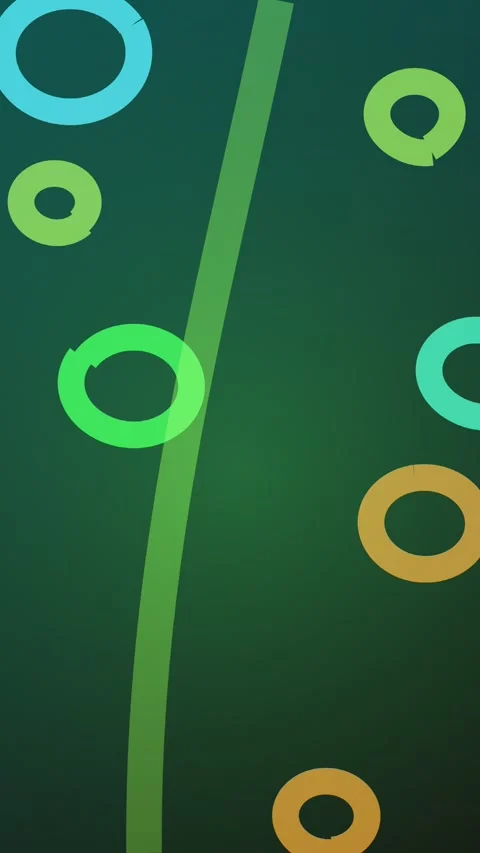 Abstract circles float on a vibrant green background, creating a dynamic and Video stock 327942815