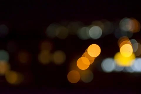 Abstract circular bokeh background of city night light, defocused Stock Photos