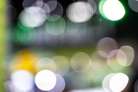 Abstract circular bokeh background of light in dining room. This image is bur Stock Photos