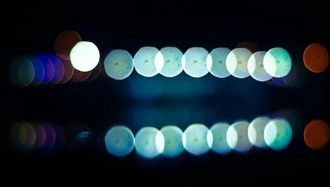 Abstract circular bokeh background with Reflection.Blurred light. Stock Photos
