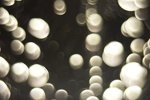 Abstract Circular Bokeh Light Patterns Against a Dark Background Stock Photos