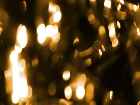 Abstract circular golden sparkle glitter bokeh flowing movement on black Stock Footage 80613544