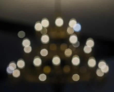 Abstract circular light bokeh on dark background Stock Photos