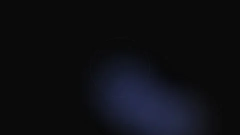 Abstract circular light particles glowing against a deep black background Stock Footage 339619459