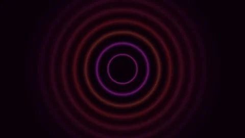 Abstract circular light waves glowing in red and purple on black background Video stock 335117714