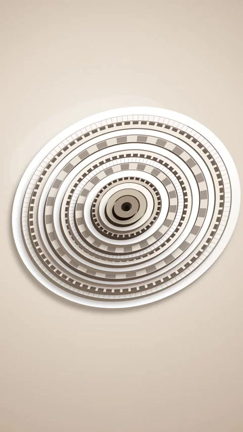 Abstract circular mechanical object rotating smoothly against clean beige b.. Stock Footage 348335485