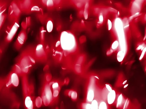 Abstract circular red sparkle glitter bokeh flowing movement on black background Stock Footage 80630789