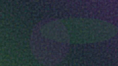 Abstract circular shapes overlapping on a grainy dark teal textured background Video stock 335117940