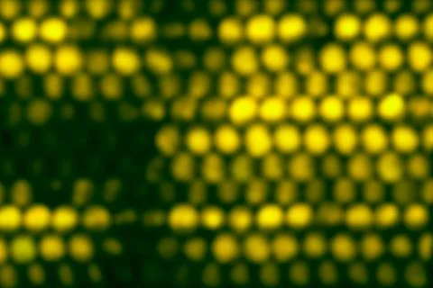 Abstract circular yellow bokeh background. Stock Photos