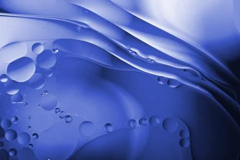 Abstract classic blue background with bubbles and smears Stock Photos