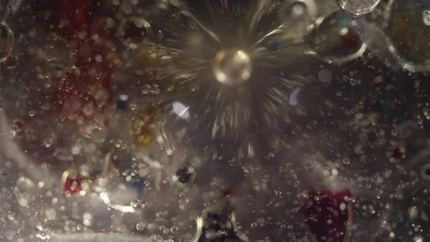 Abstract clear liquid colorful bubbles burst texture background Stock Footage 118282098
