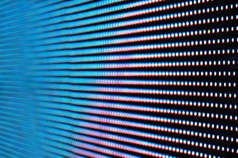 Abstract Close up Bright colored LED SMD video wall abstract background Stock Photos