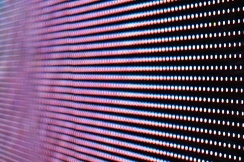 Abstract Close up Bright colored LED SMD video wall abstract background Stock Photos