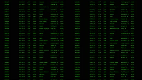 Abstract Close-up of Green Data Scrolling on Black Computer Screen Vidéo 211880990