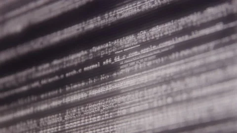 Abstract Close up of Hacker Virus Cyber Attack Scrolling on Computer Screen Stock Footage 219597960