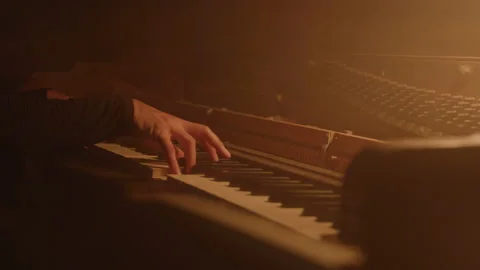 Abstract Close-up of Hands Playing Piano in Smoky Lamp Light Stock-Footage 222005569