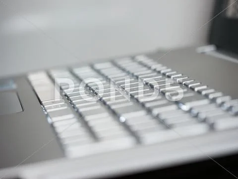Abstract close-up laptop with shallow DOF Stock Photos