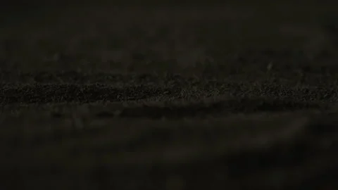 Abstract Close-up of Lightning Reflecting Off of Sand at Night Stock Footage 208801808