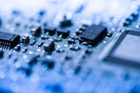Abstract close up of Mainboard Electronic computer background blue Stock Photos