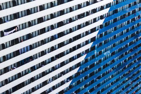 Abstract close-up of a modern skyscraper facade showing a geometric pattern.. Stock Photos
