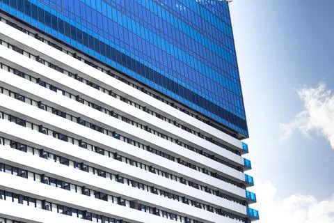 Abstract close-up of a modern skyscraper facade showing a geometric pattern.. Stock Photos