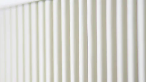 Abstract close up of a modern white corrugated fluted texture panel pattern Stock Footage 341987651
