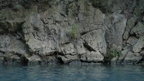 Abstract Close-Up of Mountain Rock Texture and Blue Water Stock Footage 302956114