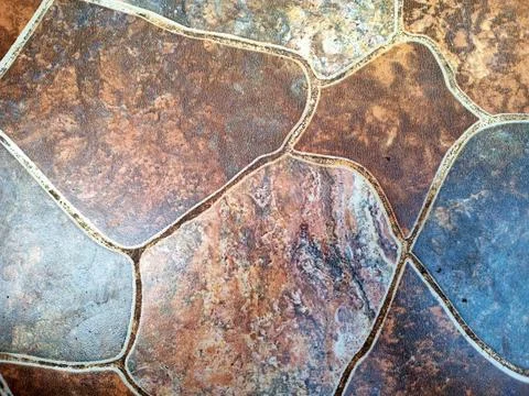 Abstract close up pattern of brown ceramic floor tiles background Stock Photos