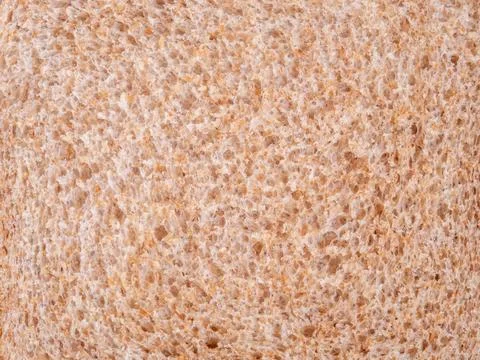 Abstract close-up of a piece of bread background texture Stock Photos