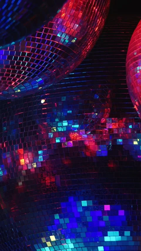Abstract Close-Up of Reflective Disco Balls with Vibrant Lighting Stock-Footage 276602324