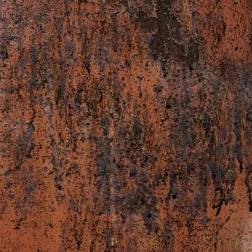 Abstract close-up of rust and aged paint on a corroded metal surface. Foto stock