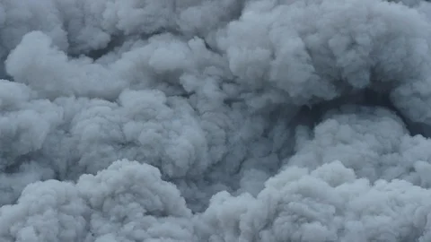 Abstract Close Up Slomotion View of Clouds of Smoke Ash and Gas After Stock Footage 113249016