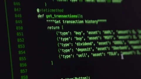 Abstract close up of source code with cinematic focus and green highlights. Vibe Stock Footage 345653891