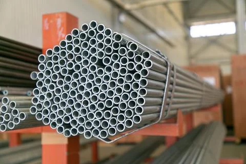 Abstract close up of a stack of steel pipes Stock Photos