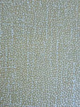 Abstract Close-Up of Textured Surface with Subtle Beaded Pattern Background Stock Photos