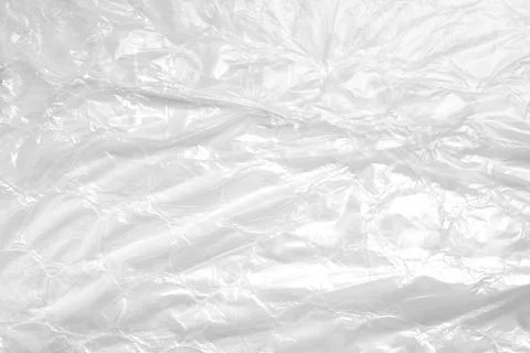 Abstract close-up of transparent crinkled packaging film with folds  Stock Photos