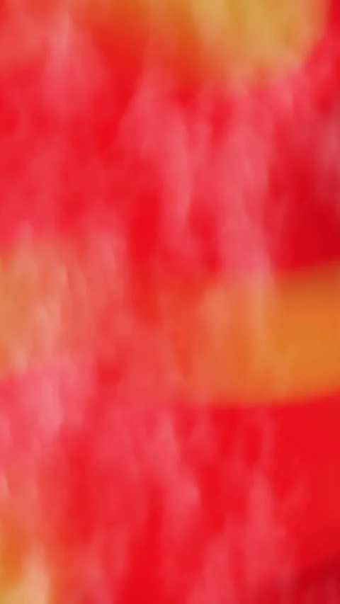 Abstract Close-up of Vibrant Red and Yellow Pattern with Dynamic Texture Stock Footage 316397044