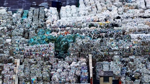 Abstract Close View of Stacked Recyclable Waste Bales Stock Footage 337387987