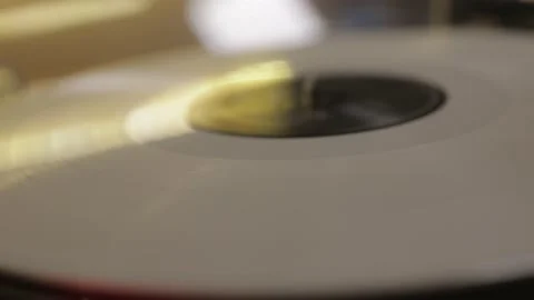 Abstract close up of white vinyl record playing on turntable Video stock 157081086