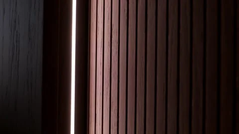 Abstract Close-Up of a Wood Panel with Modern Strip Lighting Stock Footage 318305217