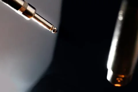 Abstract Closeup of Ends on Microphone Cable with Metal Quarter Inch Connecto Foto stock