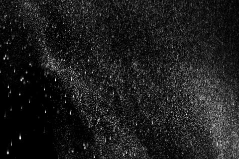 Abstract cloud with falling drops isolated on black background. White clouds, Stock Photos