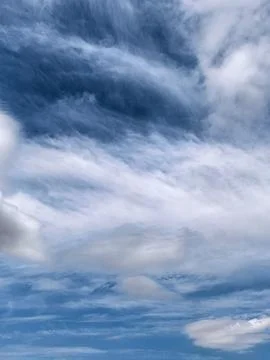 Abstract Cloud Patterns in Blue Summer Sky Stock Photos