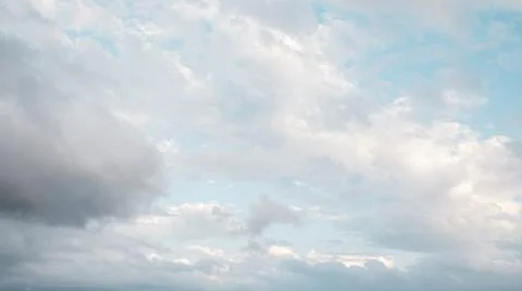 Abstract clouds in the blue sky, different shapes. Stock Photos