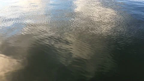 Abstract clouds reflecting on water Stock Footage 163777733