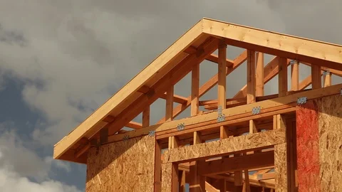 Abstract Clouds Time-lapse and New Home Construction Site Framing. Video stock 117252843