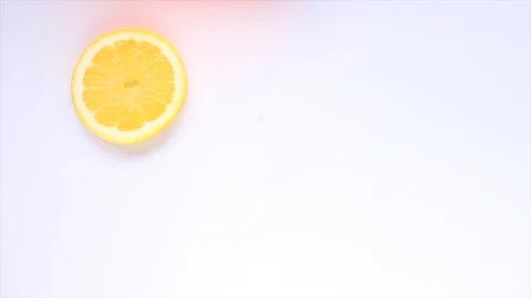 Abstract color animation of lemon on white background. uncomplicated image se Stock Footage 128896765
